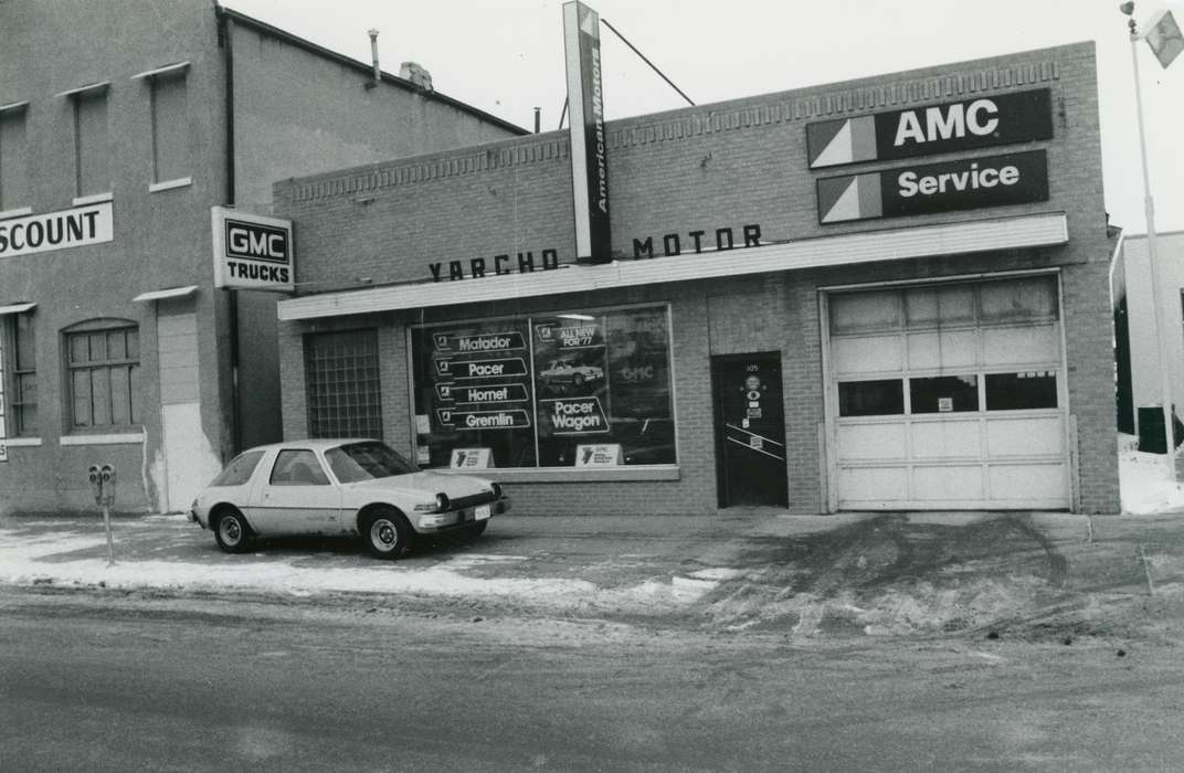 parking meter, mechanic shop, garage door, Businesses and Factories, Iowa, snow, history of Iowa, car, Iowa History, Cities and Towns, brick building, Waverly Public Library, Motorized Vehicles, Main Streets & Town Squares, sidewalk