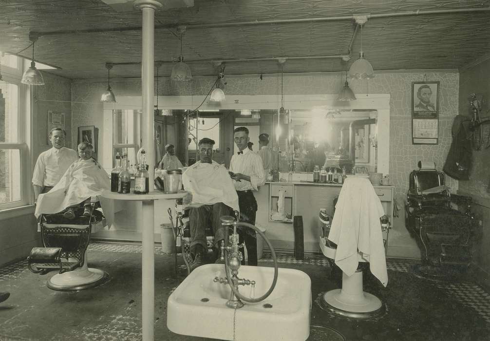 Labor and Occupations, Businesses and Factories, light, Portraits - Group, mirror, sink, apron, Children, Coon Rapids Enterprise, Cities and Towns, barber chair