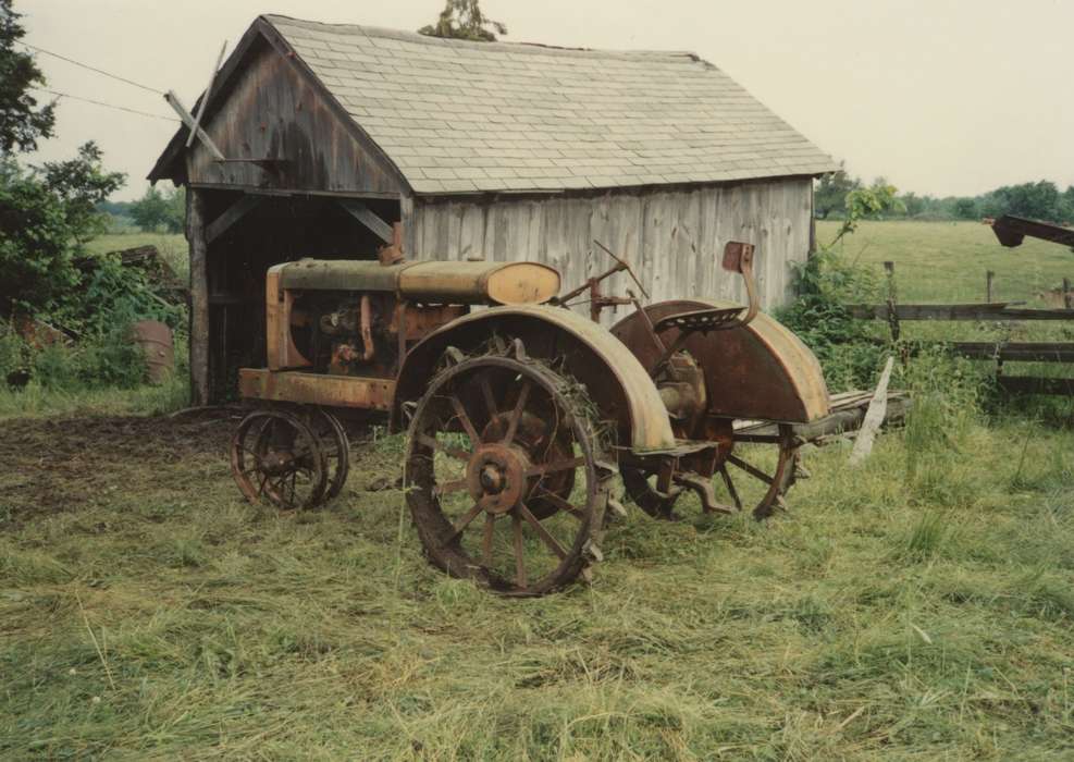 Adam, Patty, rust, wood, grass, Farming Equipment, shed, history of Iowa, Iowa, Iowa History, Douds, IA, Motorized Vehicles, Barns, tractor, wheels, hay