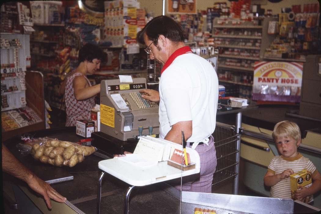 Businesses and Factories, Food and Meals, Families, Adair, history, cashier, Photos, Labor and Occupations, Children, cash register, Iowa, IA, Cities and Towns, Greenfield, United States, ia, grocery store, historic, children, Comstock, Sara