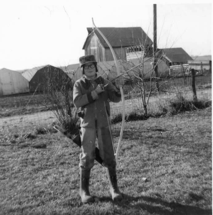 bow and arrow, boots, Farms, archery, Portraits - Individual, Outdoor Recreation, Iowa History, Iowa, Schrodt, Evelyn, history of Iowa, IA, Children