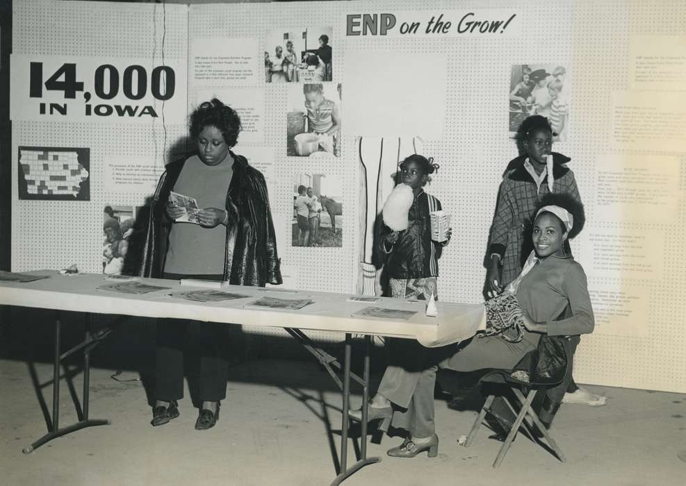 exhibit, iowa map, Photos, historic, head scarf, United States, Grout Museum of History and Science, Iowa, teen, popcorn, table, teenager, Black Hawk, teen girl, Portraits - Group, Fairs and Festivals, cotton candy, cattle congress, ia, history, headscarf, People of Color, Waterloo, IA, display, national cattle congress