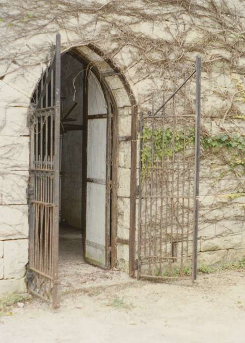 cemetery vault, Cemeteries and Funerals, history of Iowa, Waverly Public Library, Iowa History, metal gates, archway, Iowa