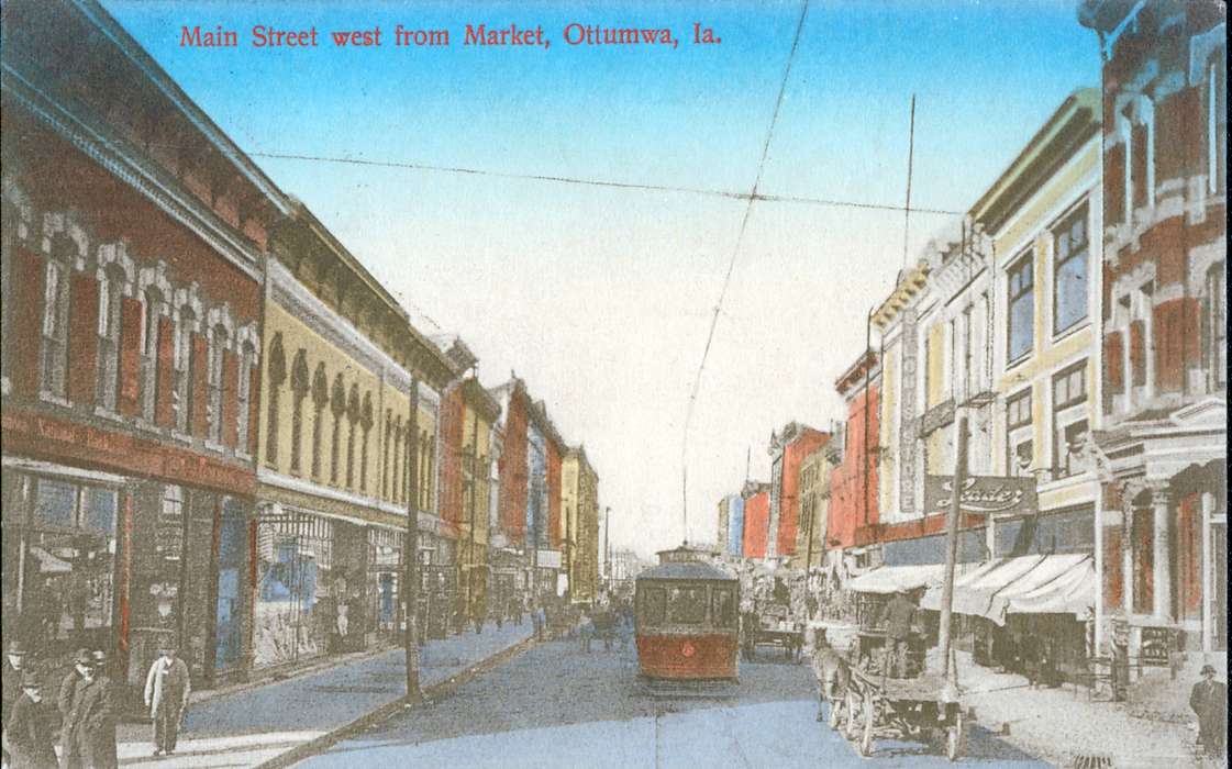 Businesses and Factories, storefront, color, Iowa History, mainstreet, Iowa, Lemberger, LeAnn, Ottumwa, IA, street car, horse and buggy, Main Streets & Town Squares, Cities and Towns, history of Iowa, veranda, Motorized Vehicles