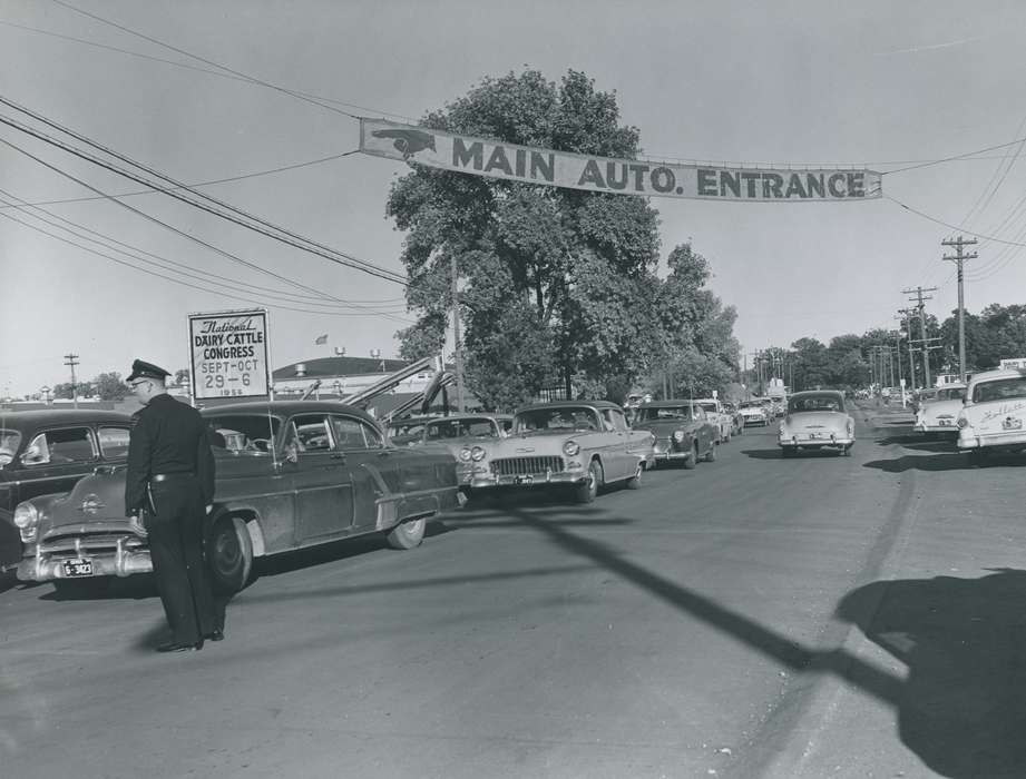 Cities and Towns, Photos, historic, Motorized Vehicles, traffic, Grout Museum of History and Science, United States, Iowa, Labor and Occupations, Black Hawk, traffic cop, Fairs and Festivals, ia, cattle congress, history, car, Waterloo, IA, police officer, national cattle congress