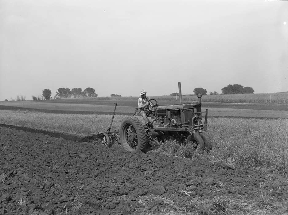 Iowa History, plow, Farms, plowing, history of Iowa, farmer, Motorized Vehicles, cultivation, Farming Equipment, Labor and Occupations, tractor, Portraits - Individual, Iowa, Library of Congress