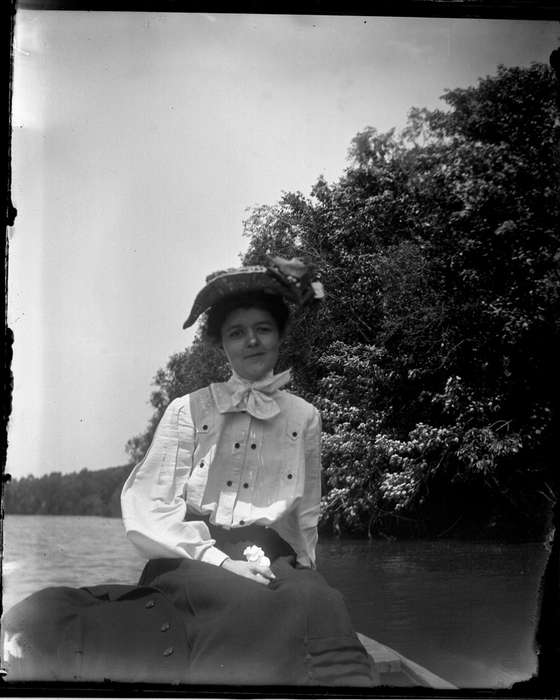 blouse, long skirt, Anamosa Library & Learning Center, hat, bow tie, Portraits - Individual, Outdoor Recreation, river, Iowa History, Lakes, Rivers, and Streams, woman, Iowa, Leisure, boat, history of Iowa, IA