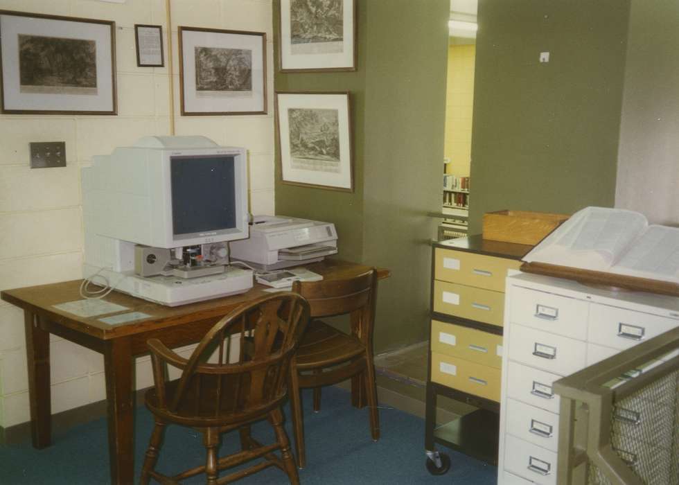 Leisure, Iowa, wooden desk, desktop computer, history of Iowa, Waverly Public Library, Iowa History, metal cabinets, wooden chair, printer
