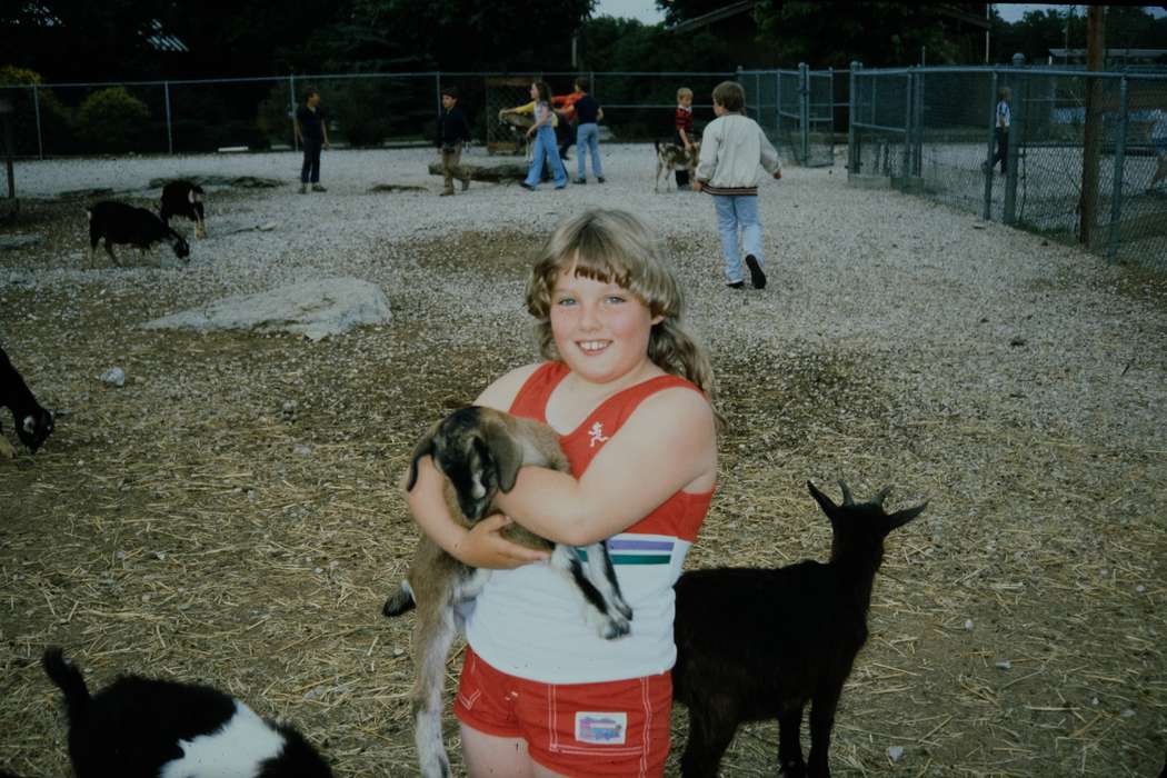 Farms, school trip, children, little girl, Children, gravel, chain link fence, Animals, Travel, history, Iowa, goats, Coon Rapids Enterprise, second grade missouri trip, Kansas City, Photos, ia, girl, United States, farm, missouri trip, Entertainment, MO, historic