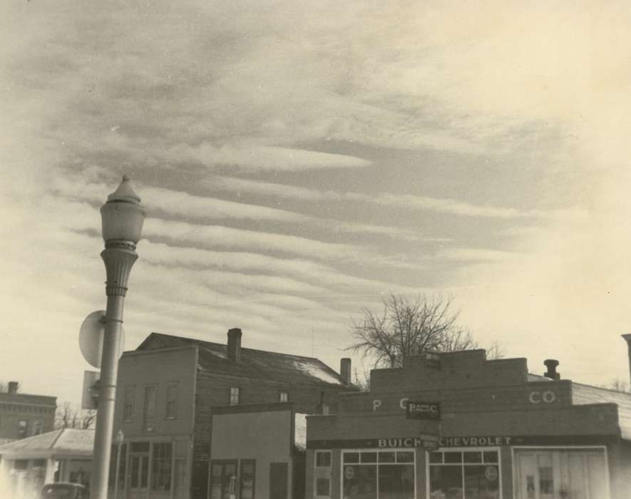 Waverly Public Library, Main Streets & Town Squares, clouds, car dealership, Cities and Towns, Iowa, Iowa History, lightpost, Waverly, IA, history of Iowa