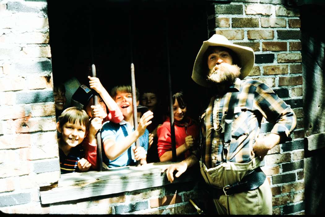 school trip, children, Children, brick building, history, Iowa, Coon Rapids Enterprise, second grade missouri trip, Kansas City, overalls, Photos, bucket hat, ia, United States, plaid shirt, missouri trip, adult man, beard, boys, MO, historic