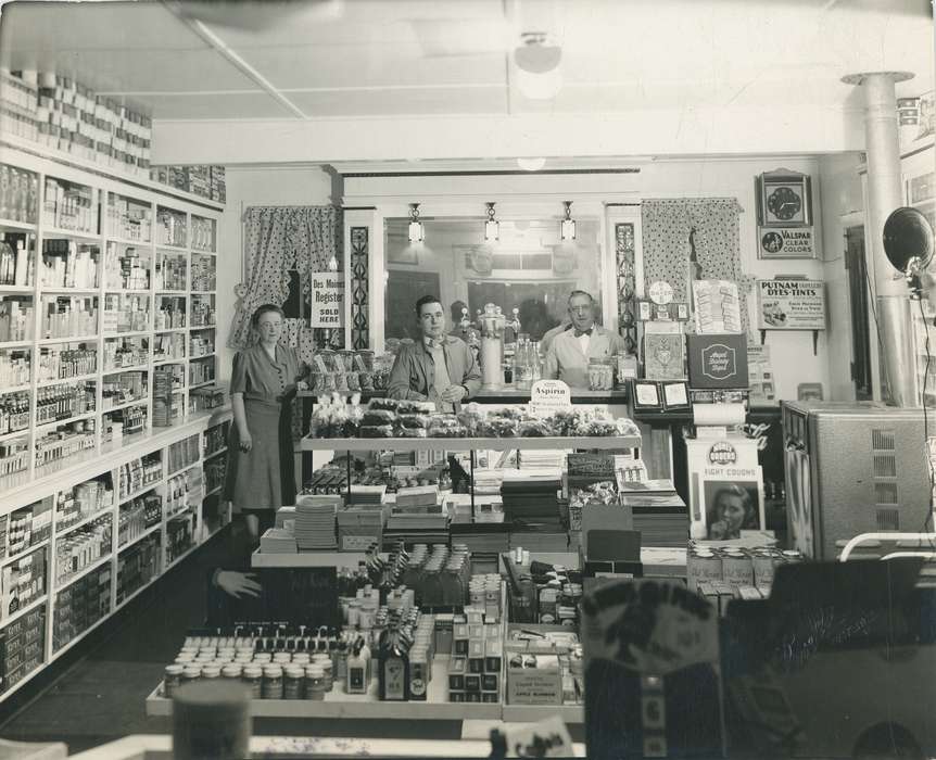 history of Iowa, drug store, drugstore, clock, correct date needed, Iowa, display case, Portraits - Group, Waverly, IA, Waverly Public Library, Iowa History, Labor and Occupations, Businesses and Factories, lagomarcino, curtains, lights
