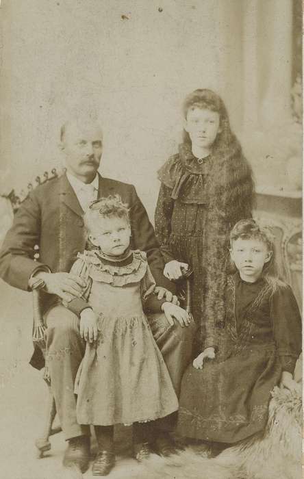 history of Iowa, girl, man, siblings, Iowa, Families, carte de visite, Iowa History, Olsson, Ann and Jons, mustache, four in hand tie, correct date needed, Des Moines, IA, Portraits - Group, sack coat, sisters, family