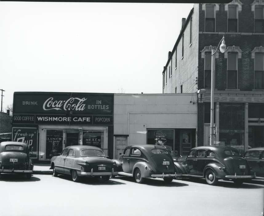 coca cola, Businesses and Factories, Iowa, Waverly Public Library, Main Streets & Town Squares, Motorized Vehicles, cafe, Iowa History, sign, Cities and Towns, coke sign, Waverly, IA, building, car, license plate, history of Iowa, window, brick building, shop