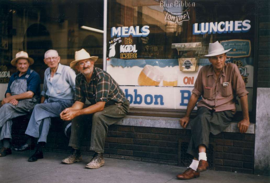 Cities and Towns, storefront, Waverly, IA, Portraits - Group, advertisement, Leisure, bench, Main Streets & Town Squares, shoes, history of Iowa, restaurant, Businesses and Factories, plaid, hat, boots, sign, beer, Waverly Public Library, Iowa History, Iowa, overalls