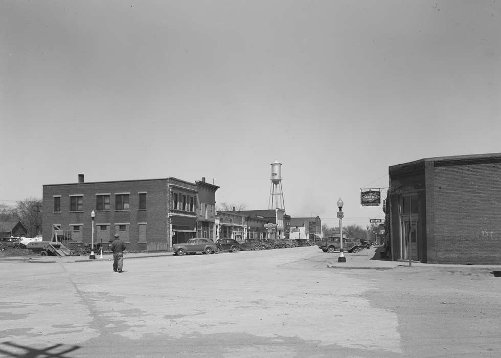 lamppost, Businesses and Factories, Cities and Towns, mainstreet, Iowa, buildings, Iowa History, Motorized Vehicles, street corner, history of Iowa, Ackerman, Bill, Main Streets & Town Squares, water tower, street parking