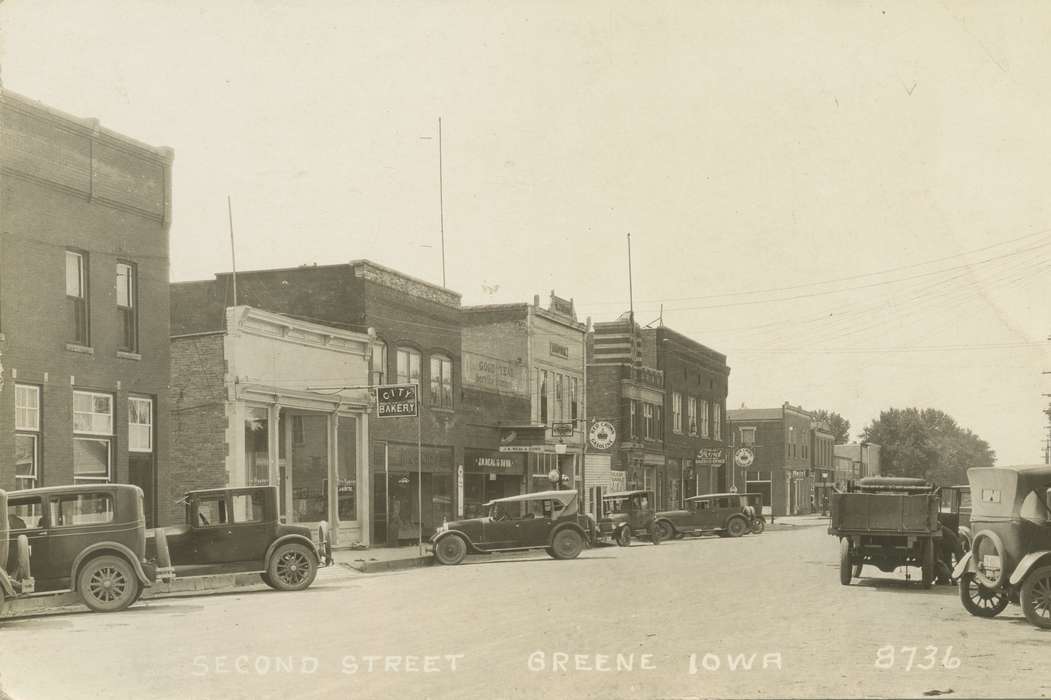 history of Iowa, Cities and Towns, store, bakery, car, Greene, IA, Iowa History, truck, Iowa, Palczewski, Catherine, Motorized Vehicles, Main Streets & Town Squares