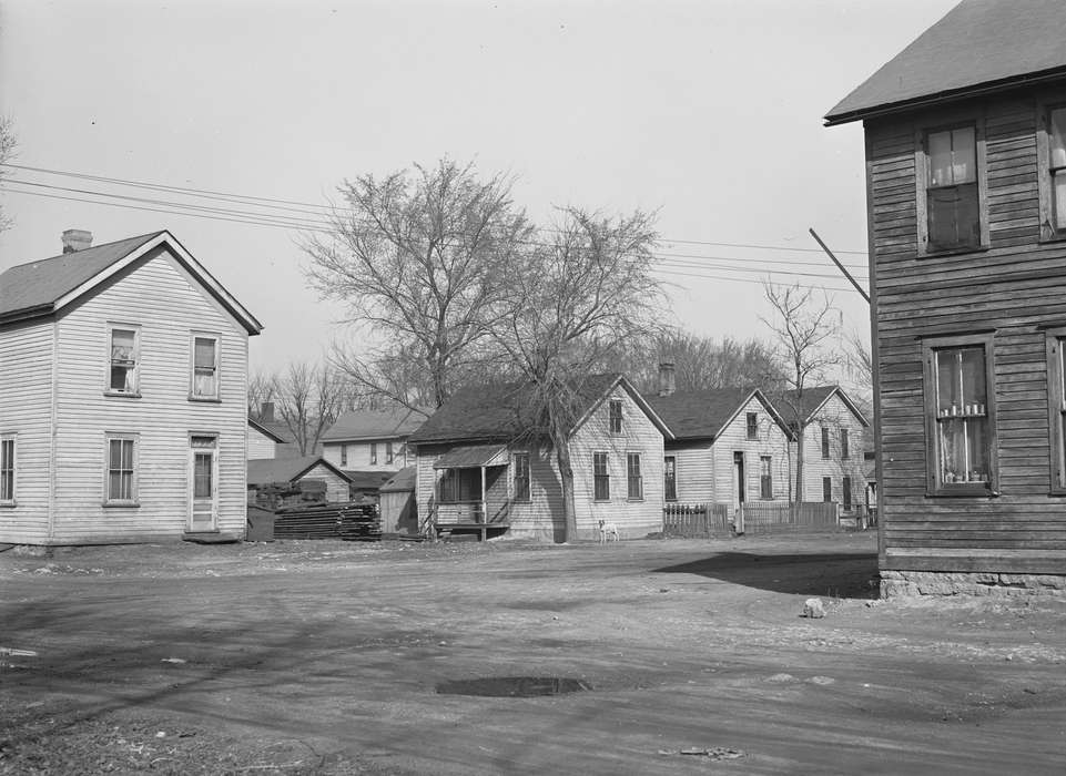 houses, Iowa, neighborhood, Homes, history of Iowa, Iowa History, Library of Congress, dirt road, wooden house, Cities and Towns