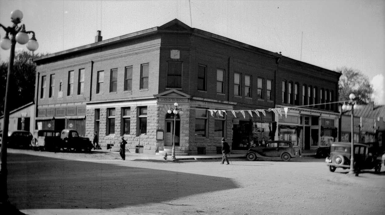 street corner, Businesses and Factories, Motorized Vehicles, bank, dirt road, flag, Iowa History, Ottumwa, IA, Main Streets & Town Squares, street light, car, Iowa, history of Iowa, Lemberger, LeAnn, Cities and Towns