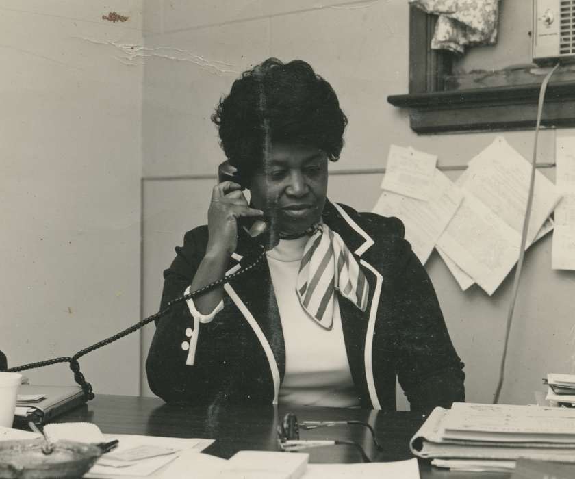 desk, People of Color, scarf, Henderson, Jesse, office, Civic Engagement, Portraits - Individual, african american, Iowa History, telephone, Iowa, Waterloo, IA, history of Iowa, Labor and Occupations
