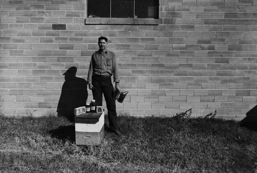 Portraits - Individual, jars, United States, history, ia, Photos, Labor and Occupations, Coon Rapids Enterprise, beekeeper, brick wall, historic, Iowa, beehive, IA, Coon Rapids, smoker