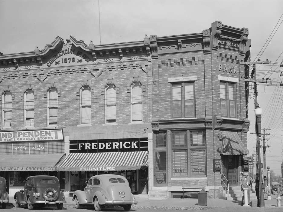 Businesses and Factories, street corner, storefront, Main Streets & Town Squares, bank, history of Iowa, Library of Congress, Cities and Towns, Motorized Vehicles, Iowa, Iowa History, brick building, mainstreet, street parking