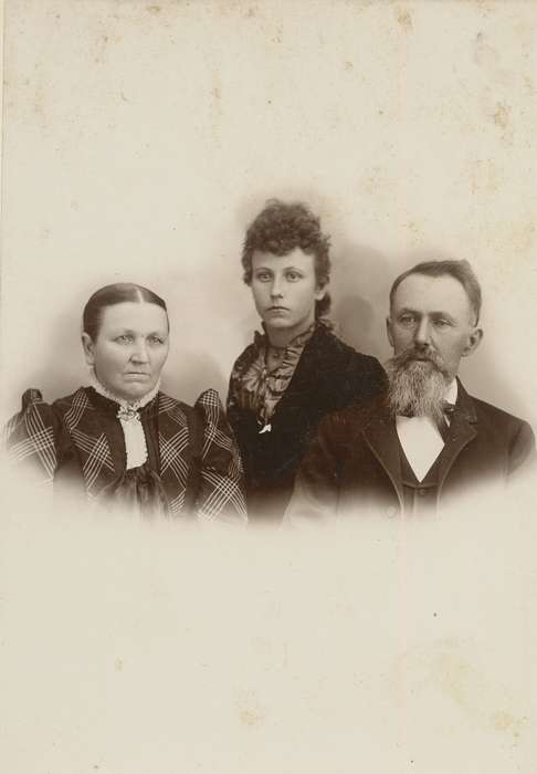 Olsson, Ann and Jons, cabinet photo, beard, couple, Portraits - Group, family, brooch, history of Iowa, mustache, Iowa History, Grand Junction, IA, bow tie, curly hair, daughter, Families, Iowa, ruffles