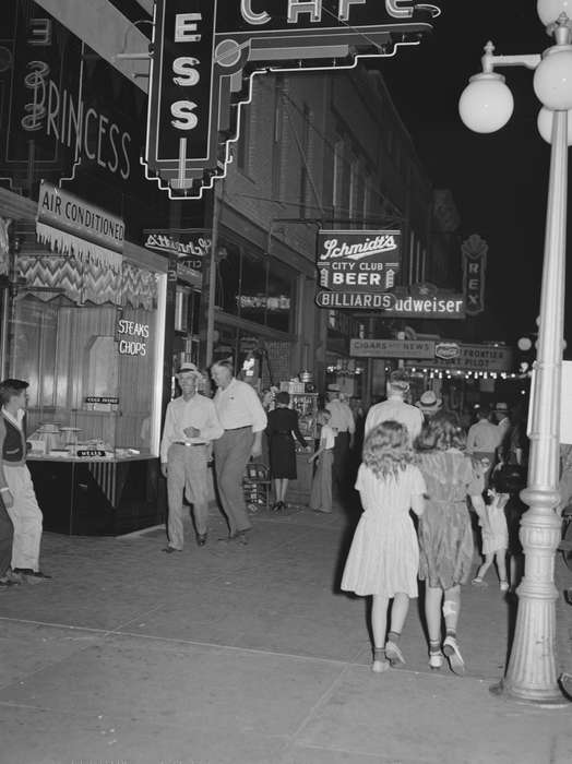 streetlights, city, history of Iowa, Leisure, Businesses and Factories, Library of Congress, Main Streets & Town Squares, Entertainment, Iowa History, mingling, storefront, Iowa, street sign, Families, Children, Cities and Towns